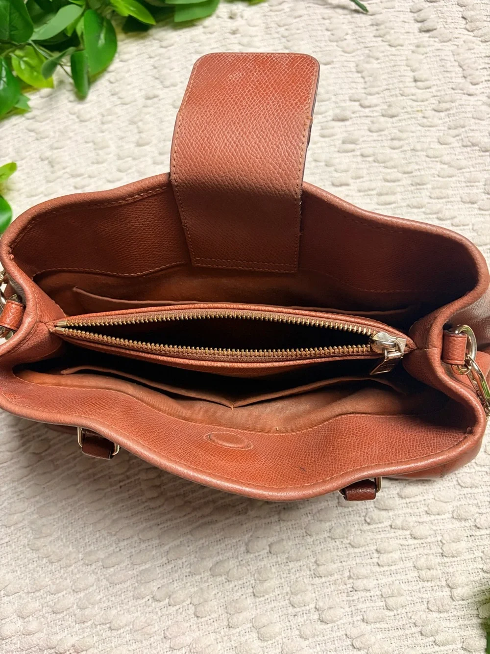Brown Coach leather and gold-tone hardware RETAIL PRICE IS $395